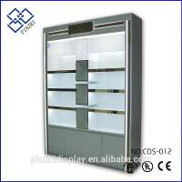 Custom design cosmetic shop fittings custom wood glass display table makeup cosmetic shelves